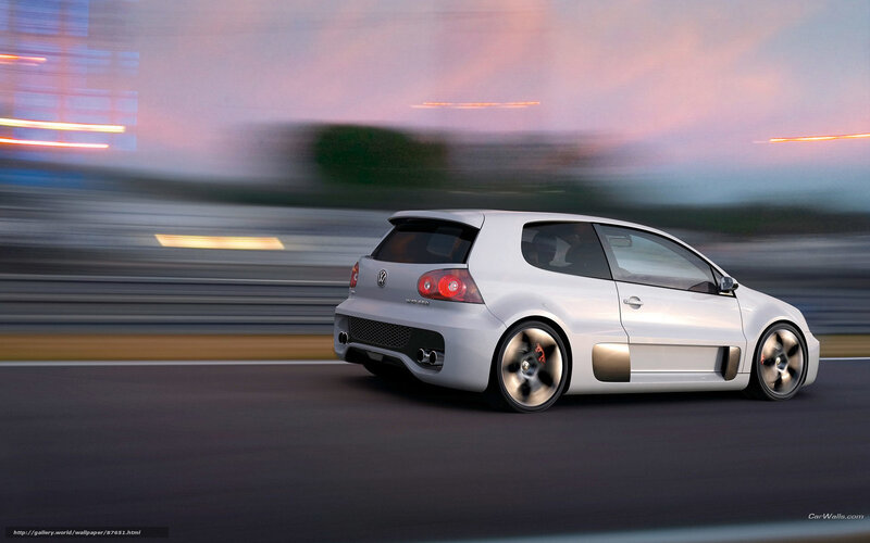 White Volkswagen GTI in motion