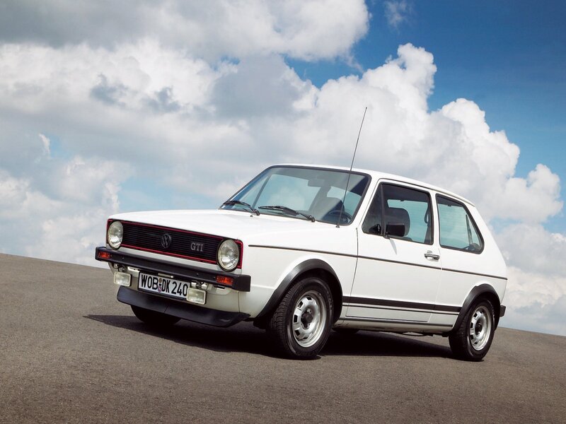 White Volkswagen GTI on a road