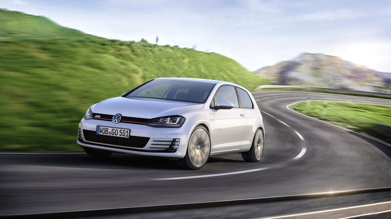 White Volkswagen GTI on a winding road