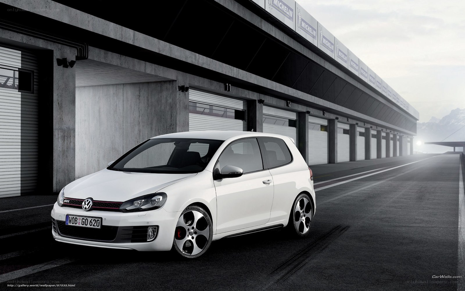 White Volkswagen GTI on racetrack