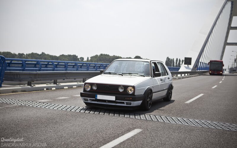 White Volkswagen on a bridge