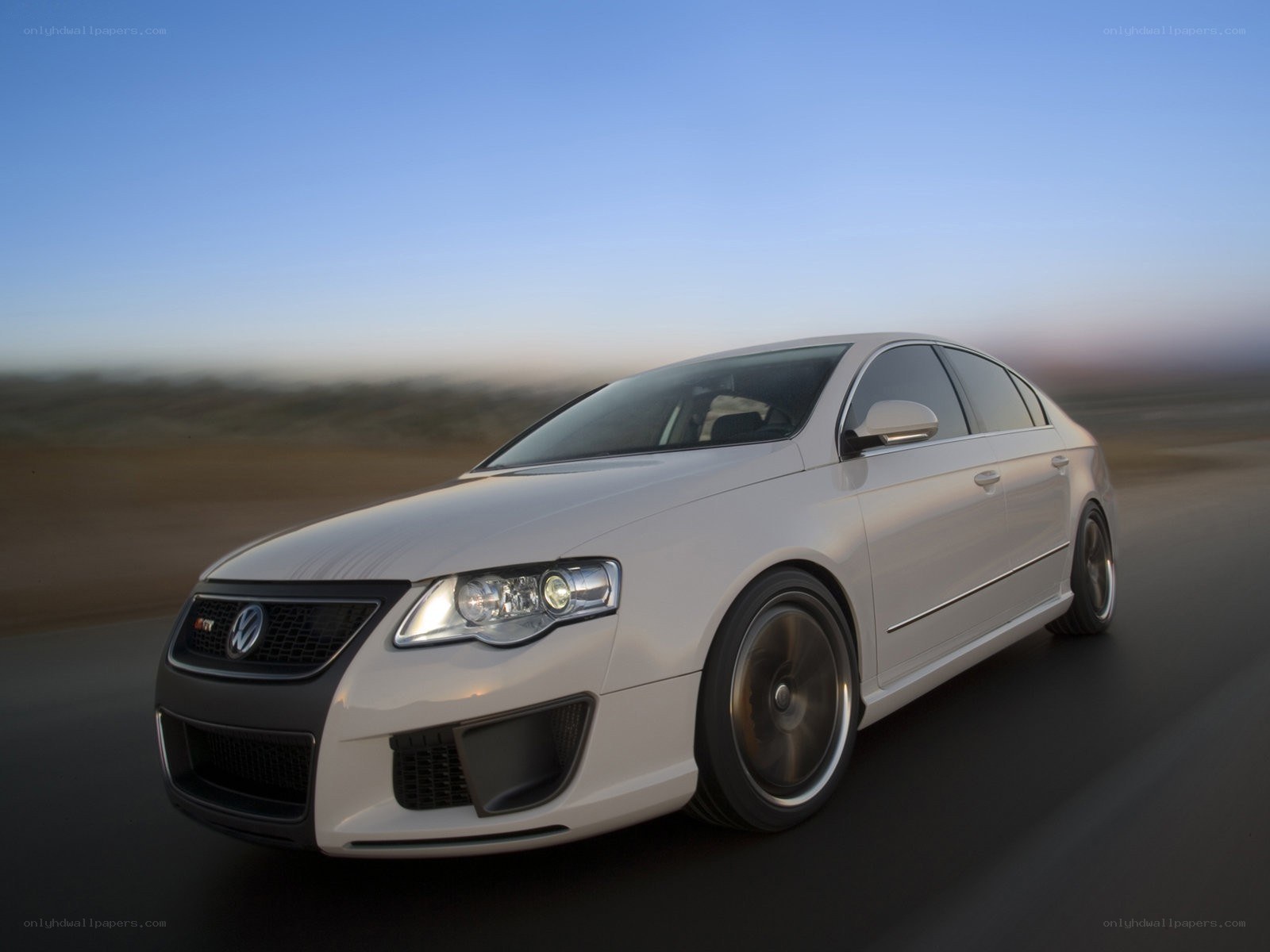 white volkswagen passat in motion
