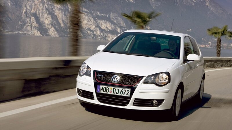 White Volkswagen Polo GTI driving