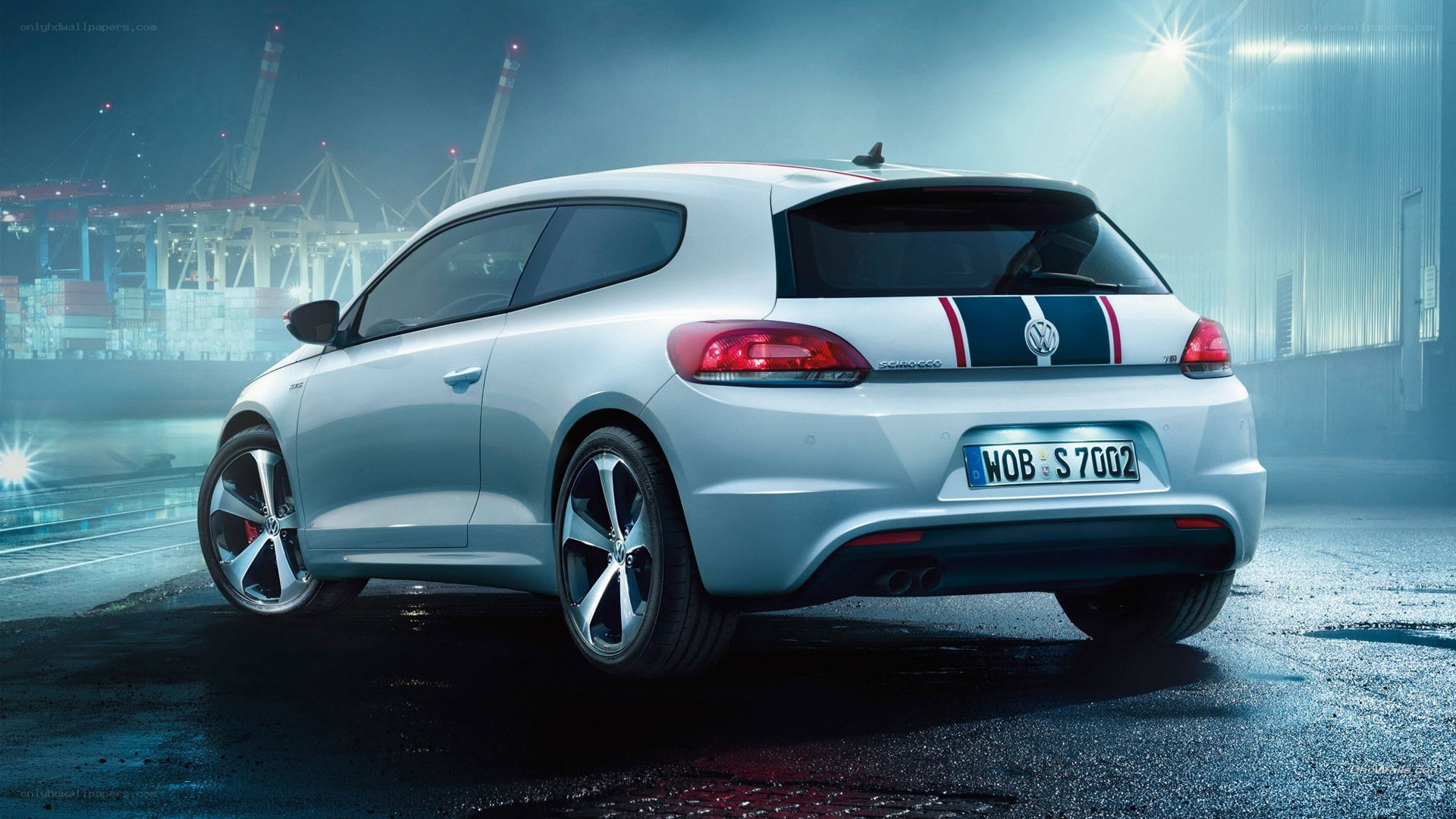 White Volkswagen Scirocco at night