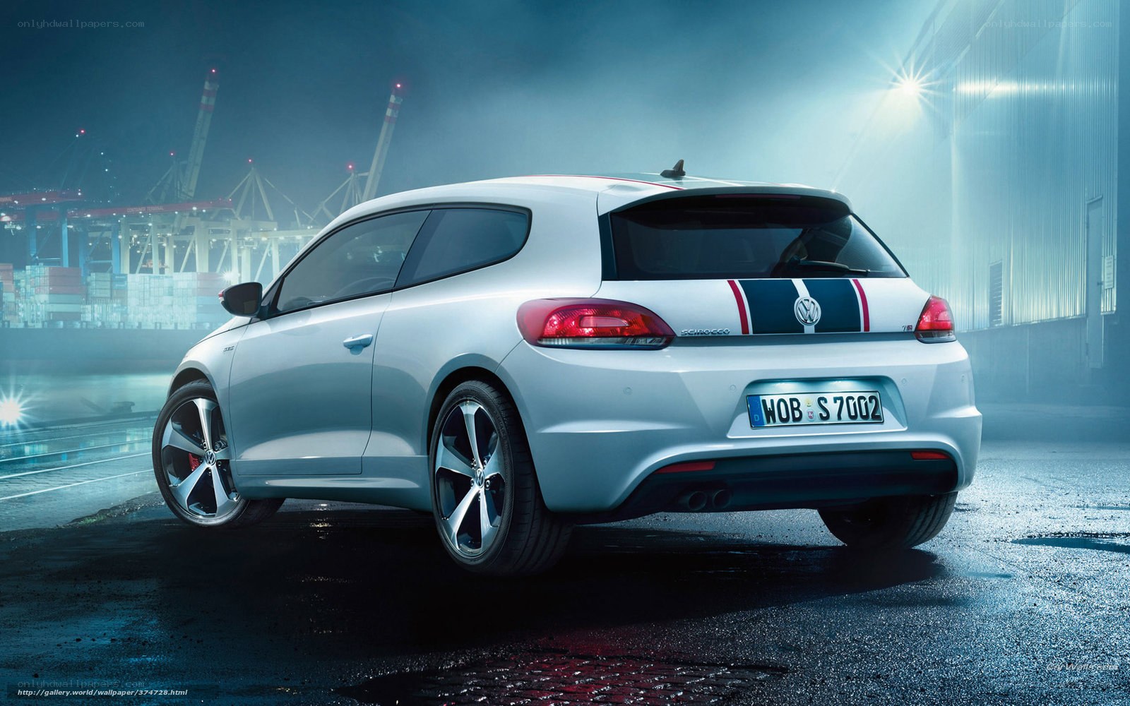 White Volkswagen Scirocco at night