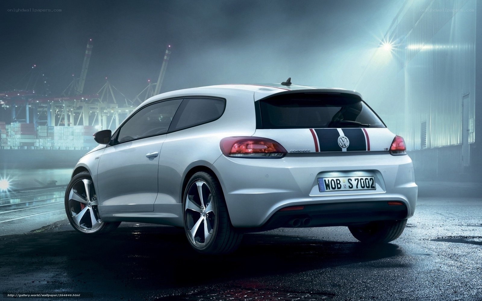 White Volkswagen Scirocco at port