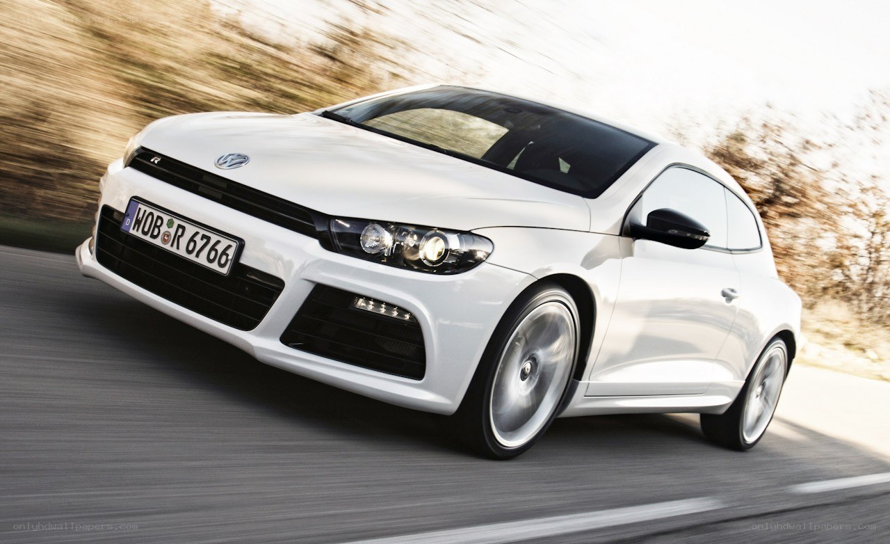 White Volkswagen Scirocco in motion