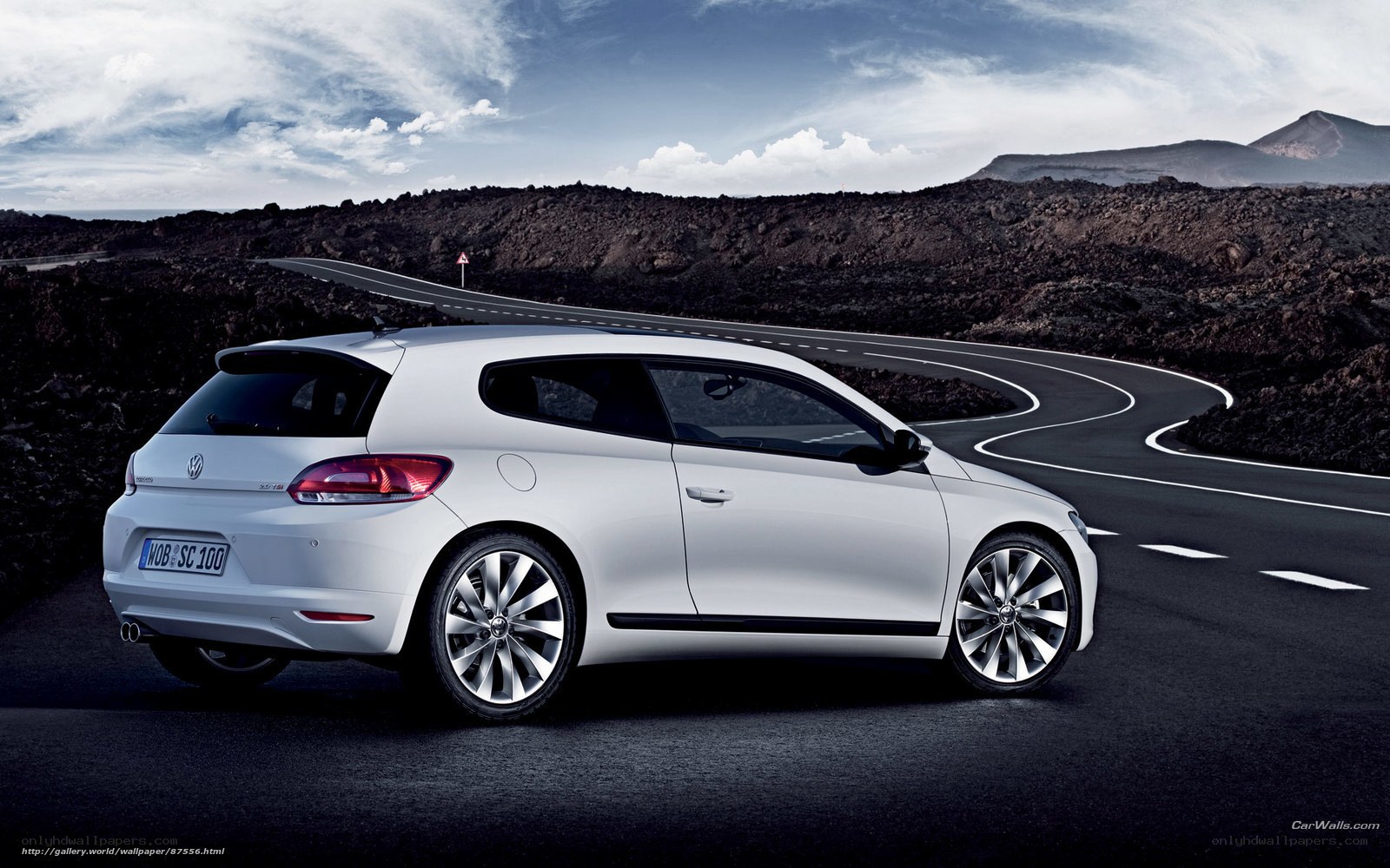 White Volkswagen Scirocco on winding road