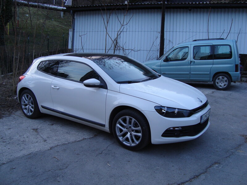 White Volkswagen Scirocco parked outside