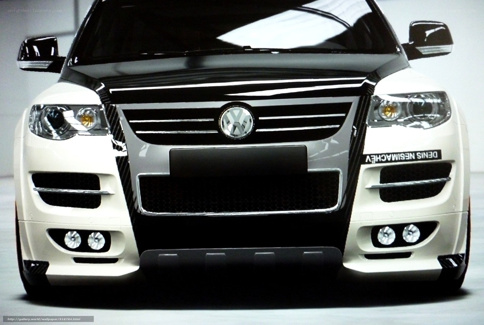 white volkswagen suv front view