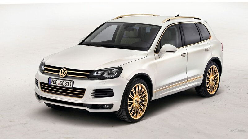 white volkswagen suv with gold accents