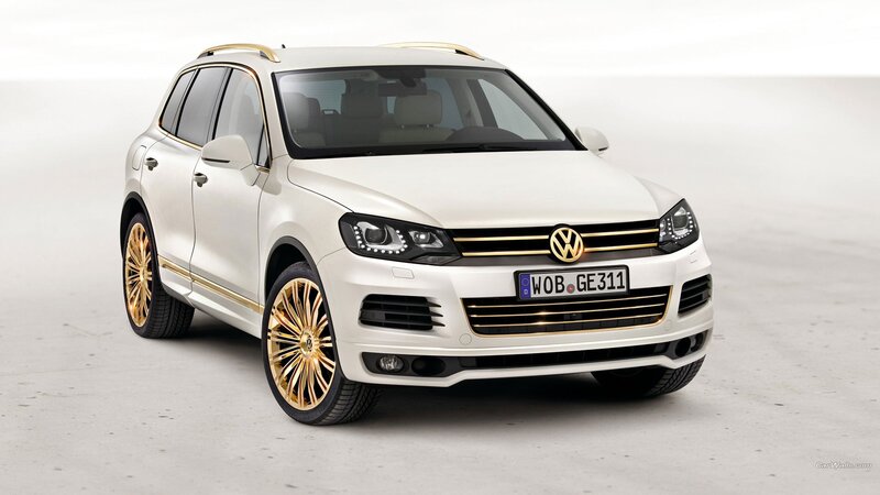 white volkswagen suv with gold accents
