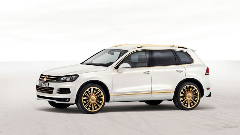 white volkswagen suv with gold accents