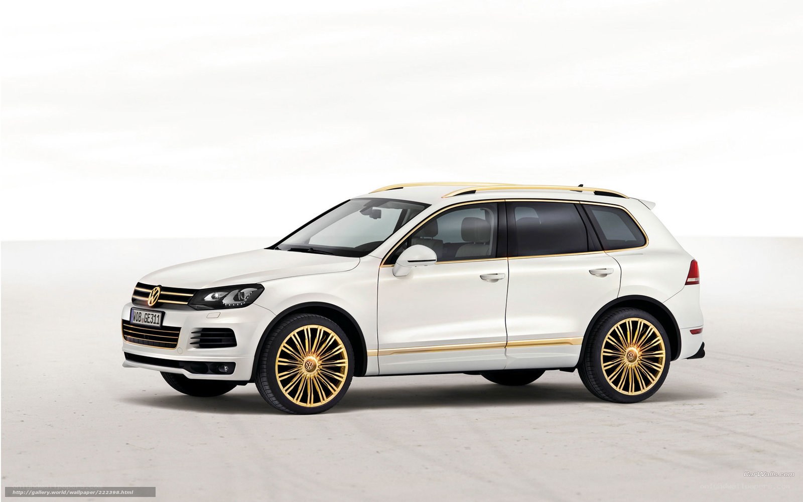 white volkswagen suv with gold accents