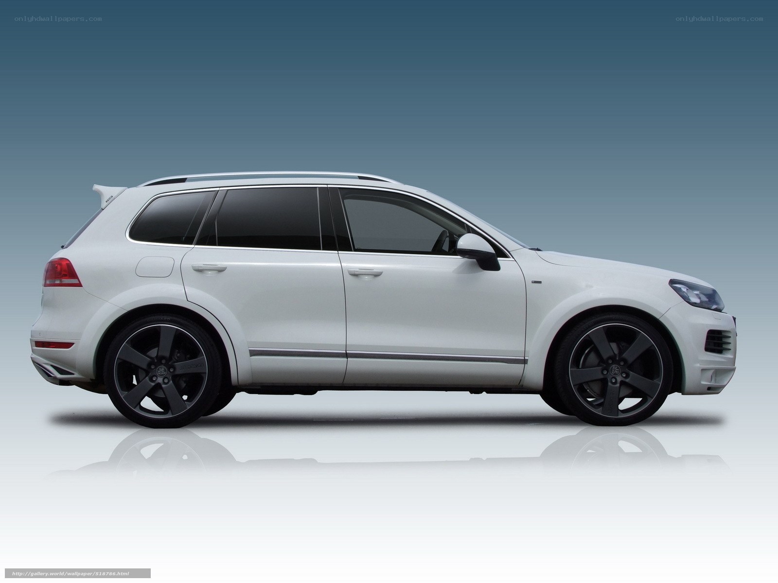 white volkswagen touareg suv