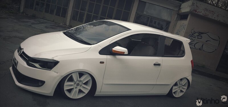 white volkswagen up car
