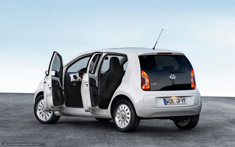 White Volkswagen Up! with open doors
