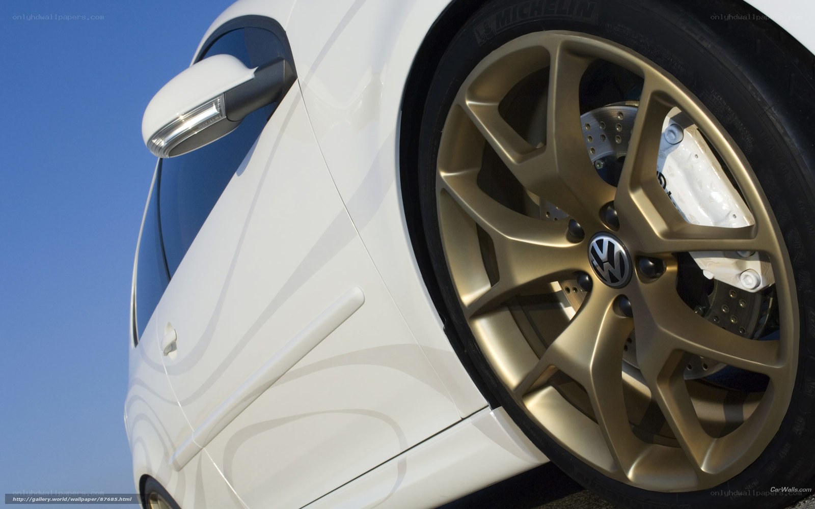 White Volkswagen with gold wheels