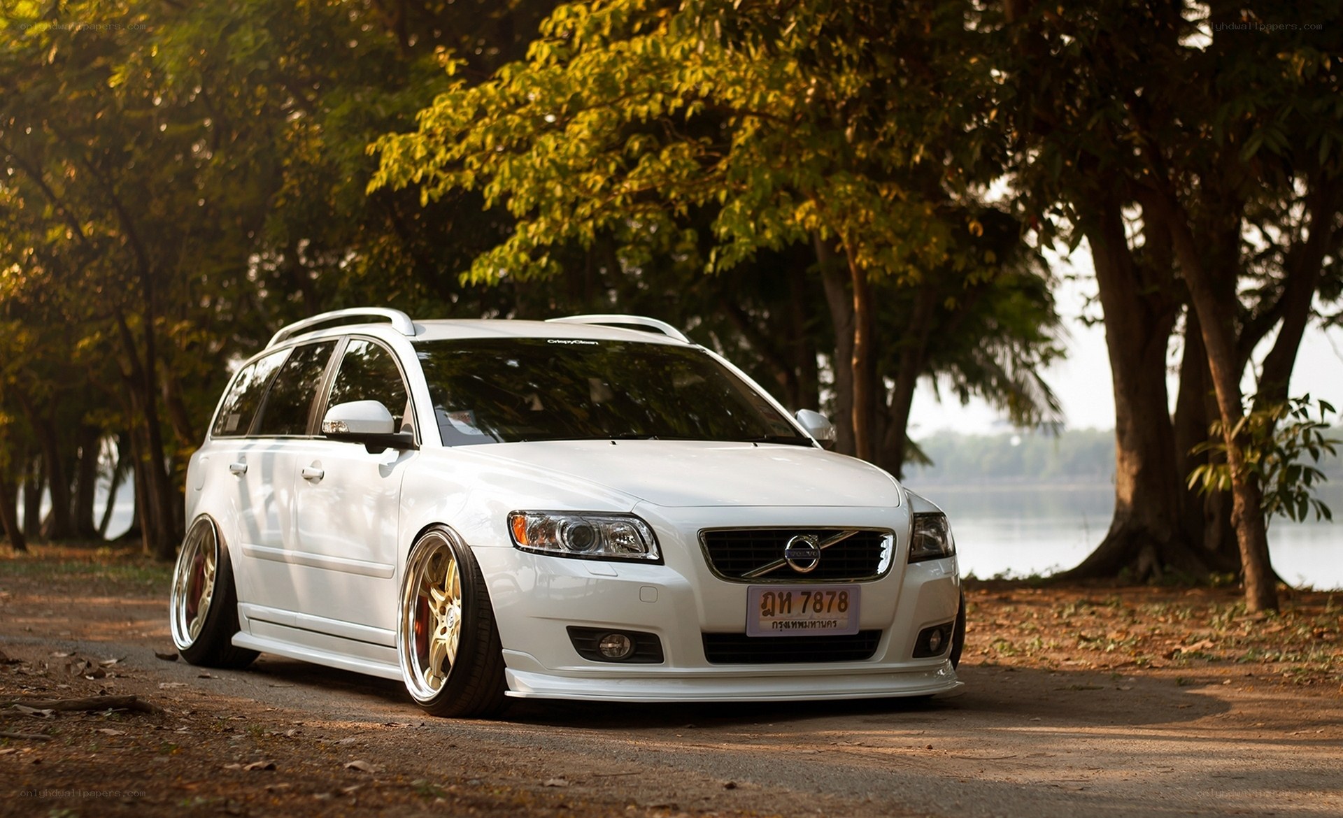White Volvo station wagon