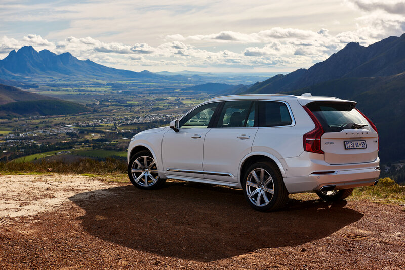 White Volvo XC90 on a mountain overlook
