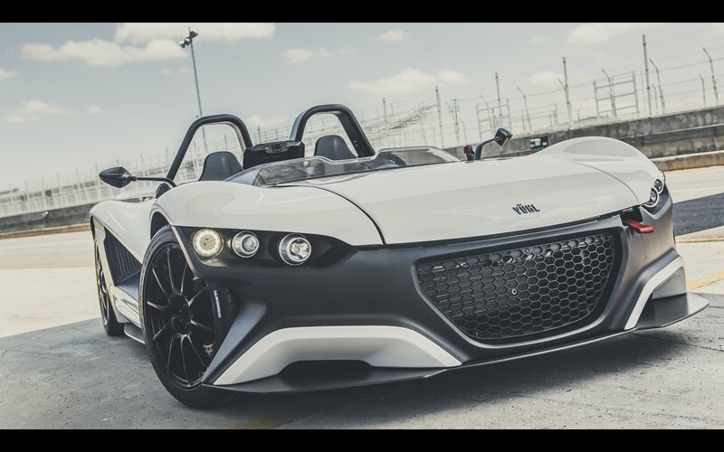 White VUHL sports car on track