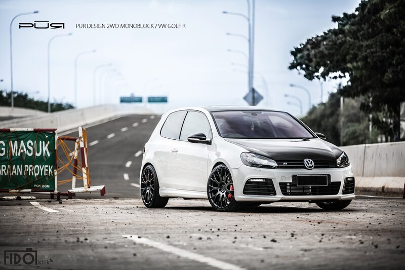 White VW Golf R on highway