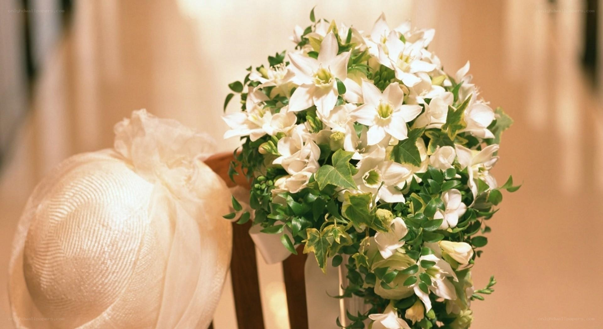 White wedding bouquet and hat