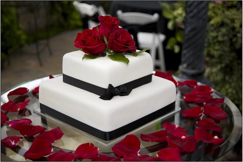 white wedding cake with roses