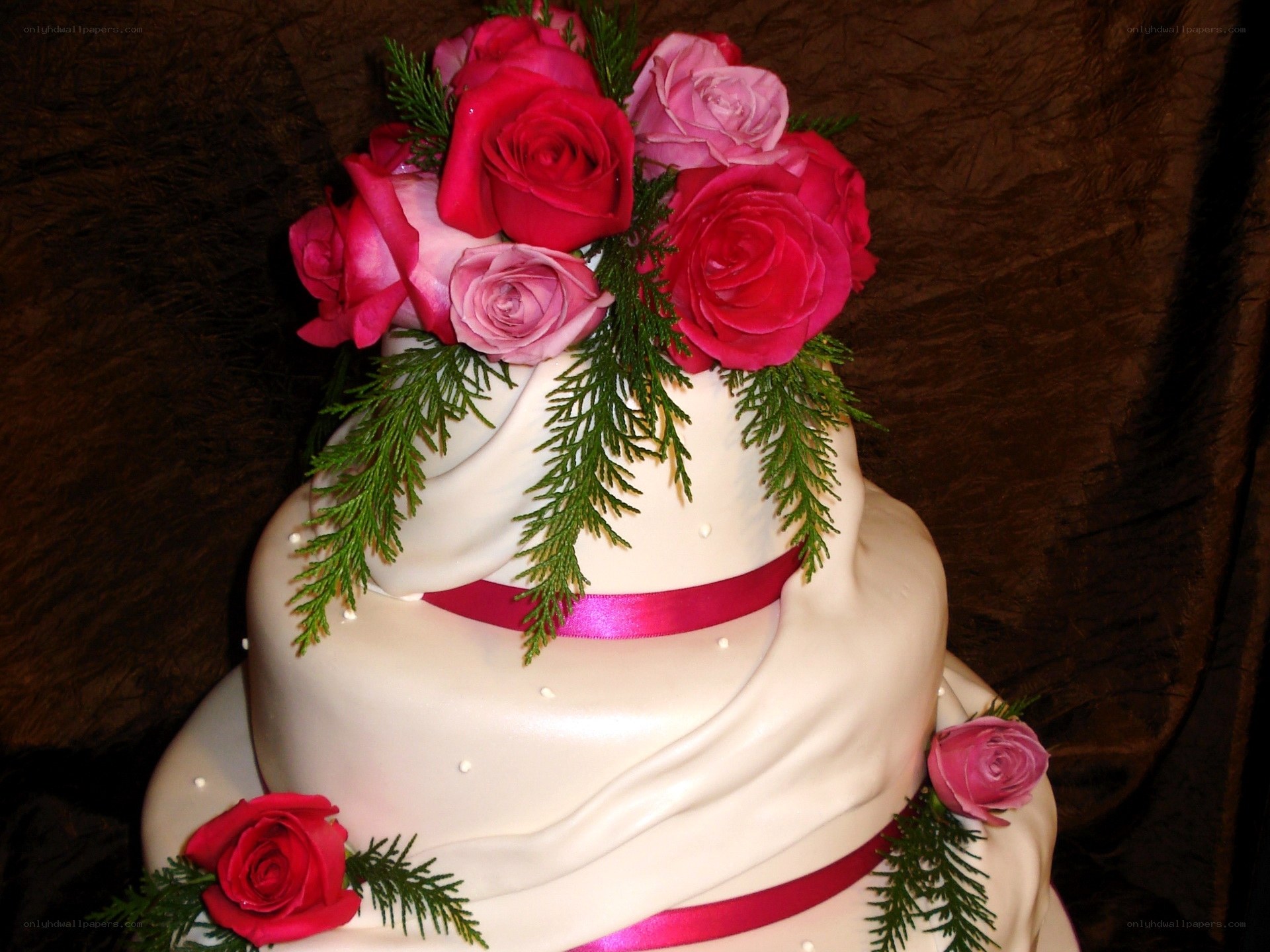 white wedding cake with roses