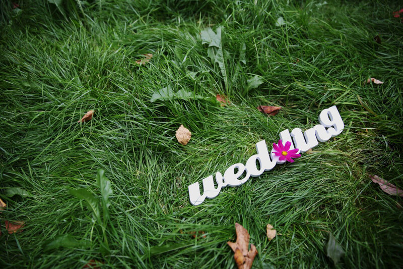 White Wedding Sign on Grass