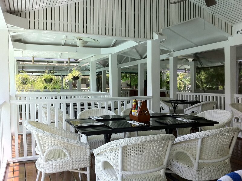 White Wicker Chairs at Table