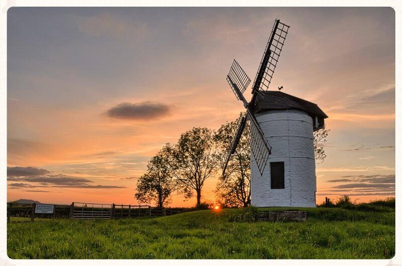 White Windmill at Sunset