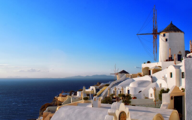 White Windmill on Cliff — Blue