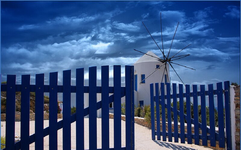 White Windmill with Blue Fence