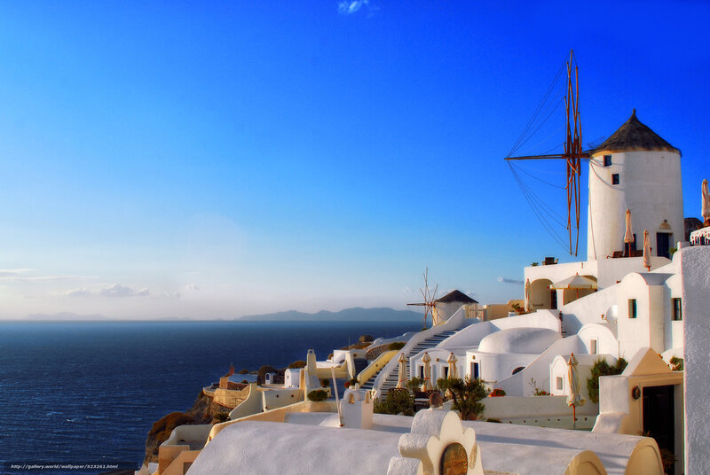 White windmills on the Greek coast