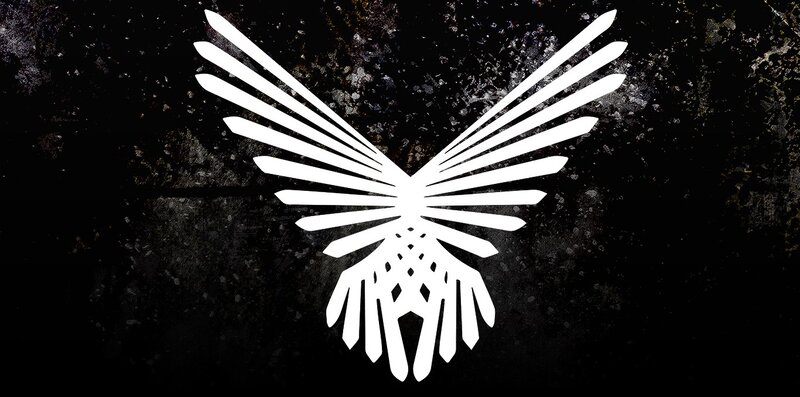 white winged symbol on dark background