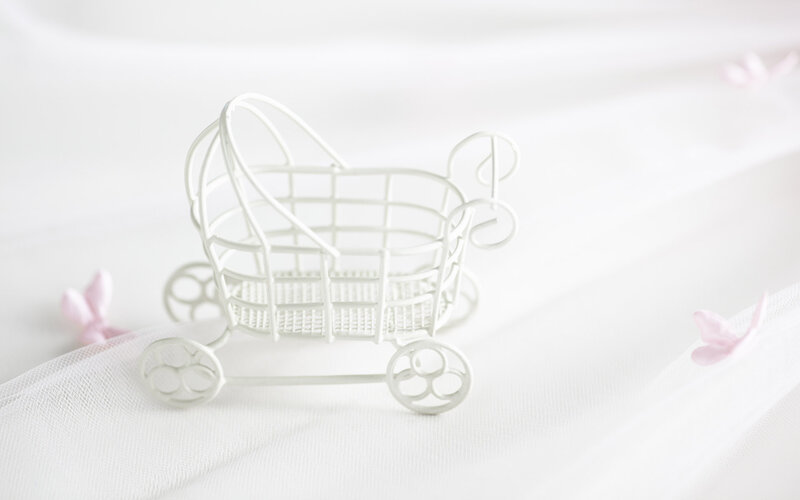 White Wire Baby Carriage