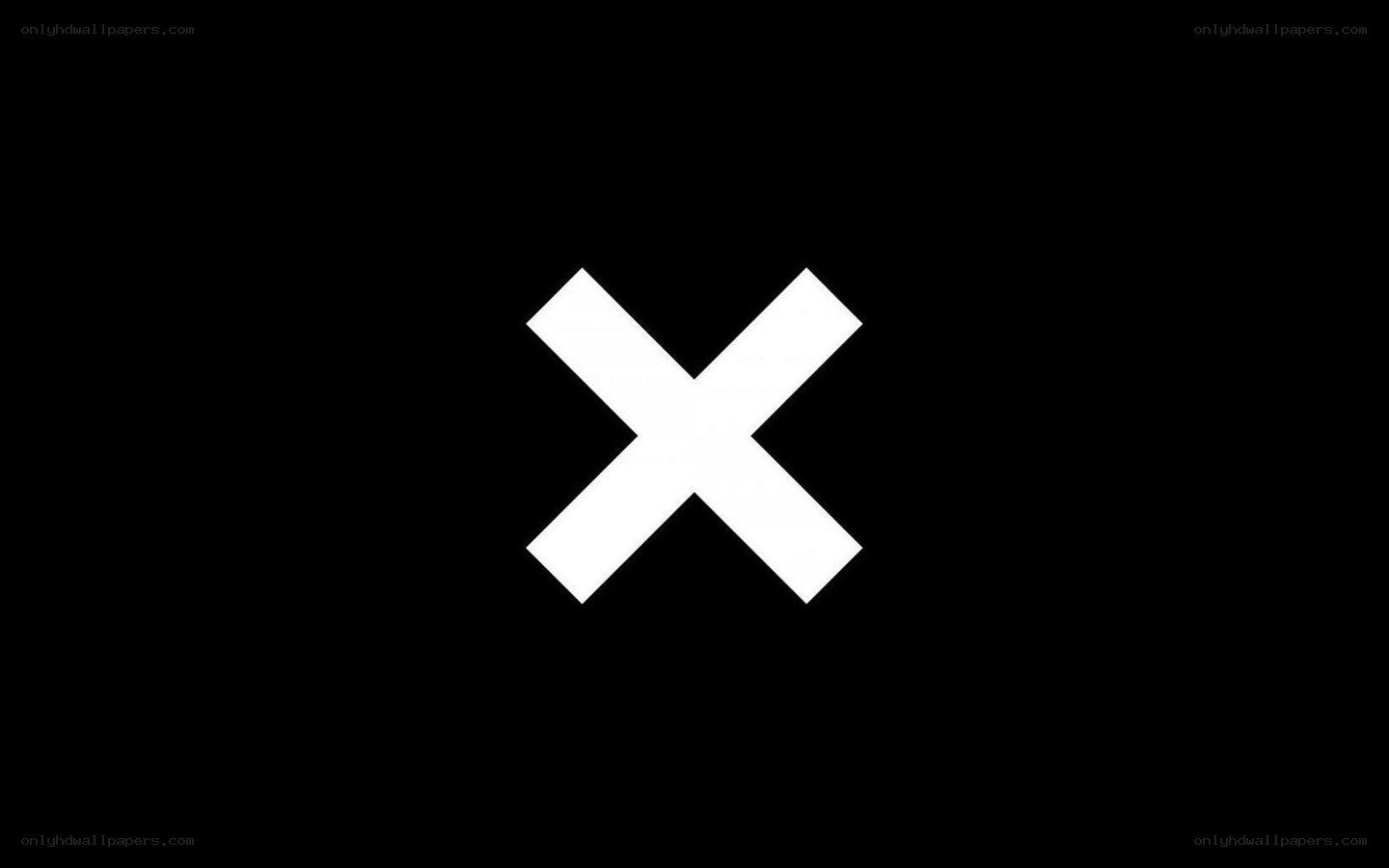 white X on black background