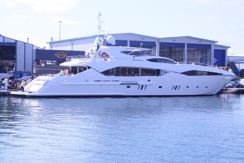 White yacht at a marina