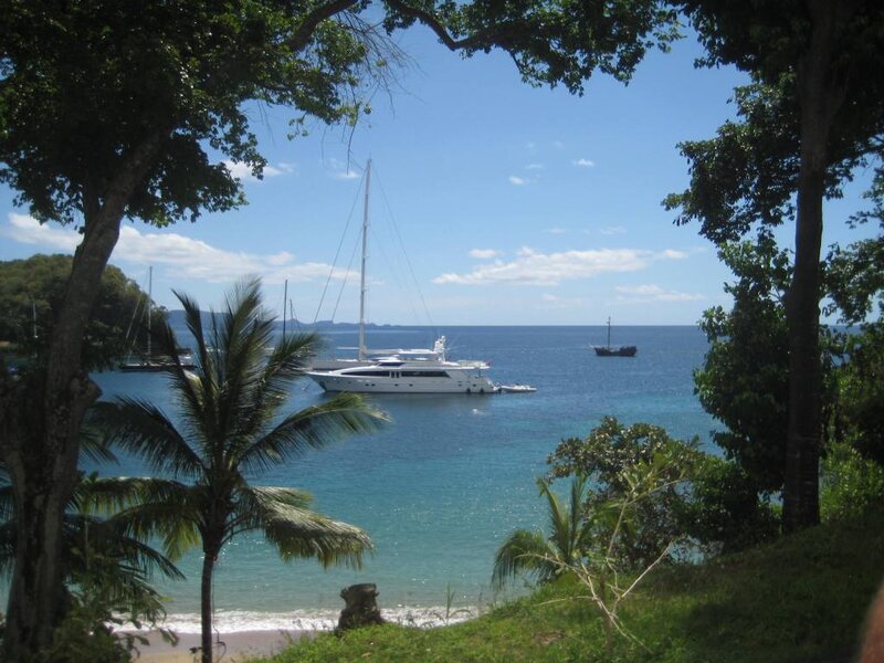White Yacht in Bay — Blue