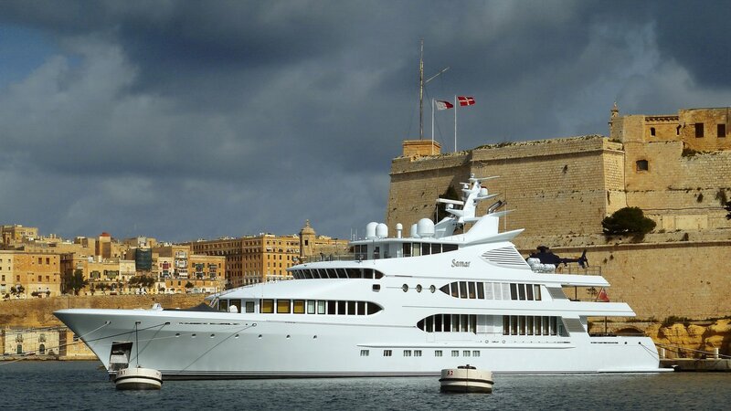 White Yacht in Harbor — Dramatic
