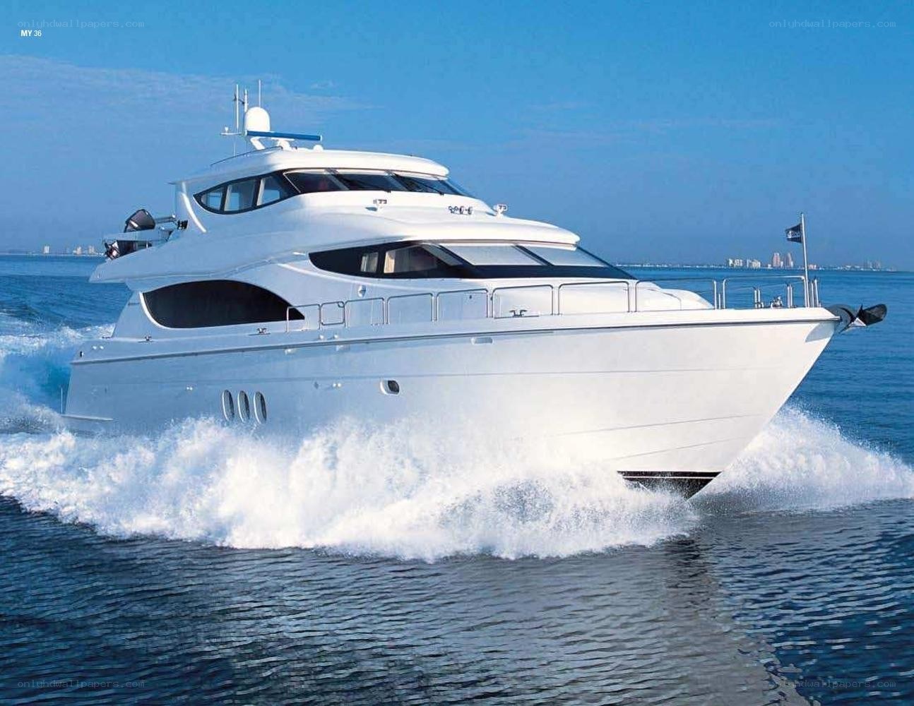 White yacht speeding on water