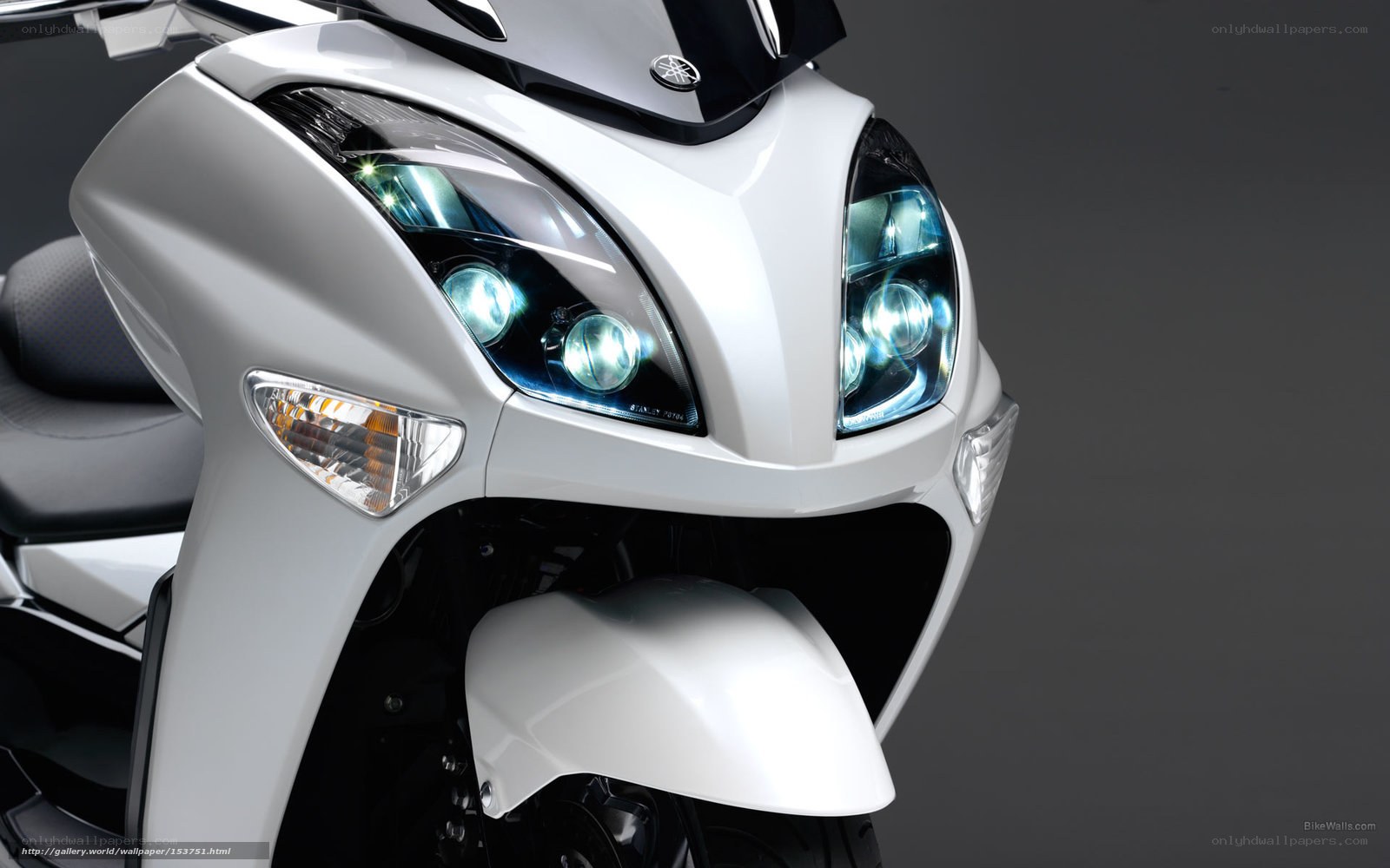 White Yamaha scooter front view