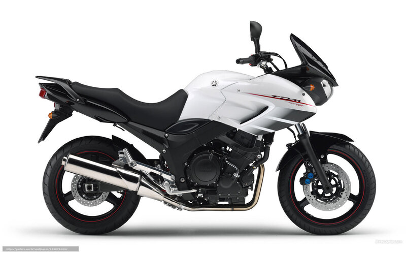 white Yamaha TDM motorcycle