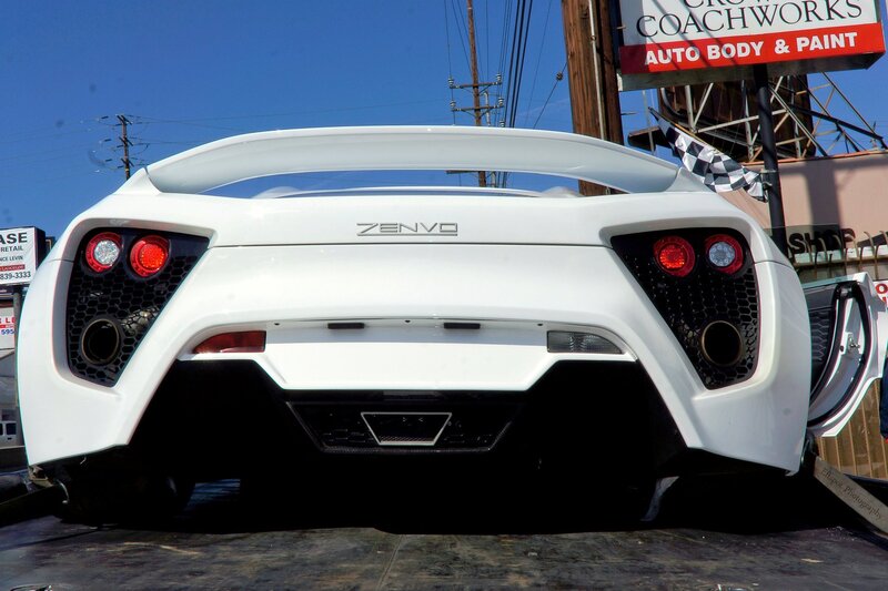 white zenvo sports car rear view
