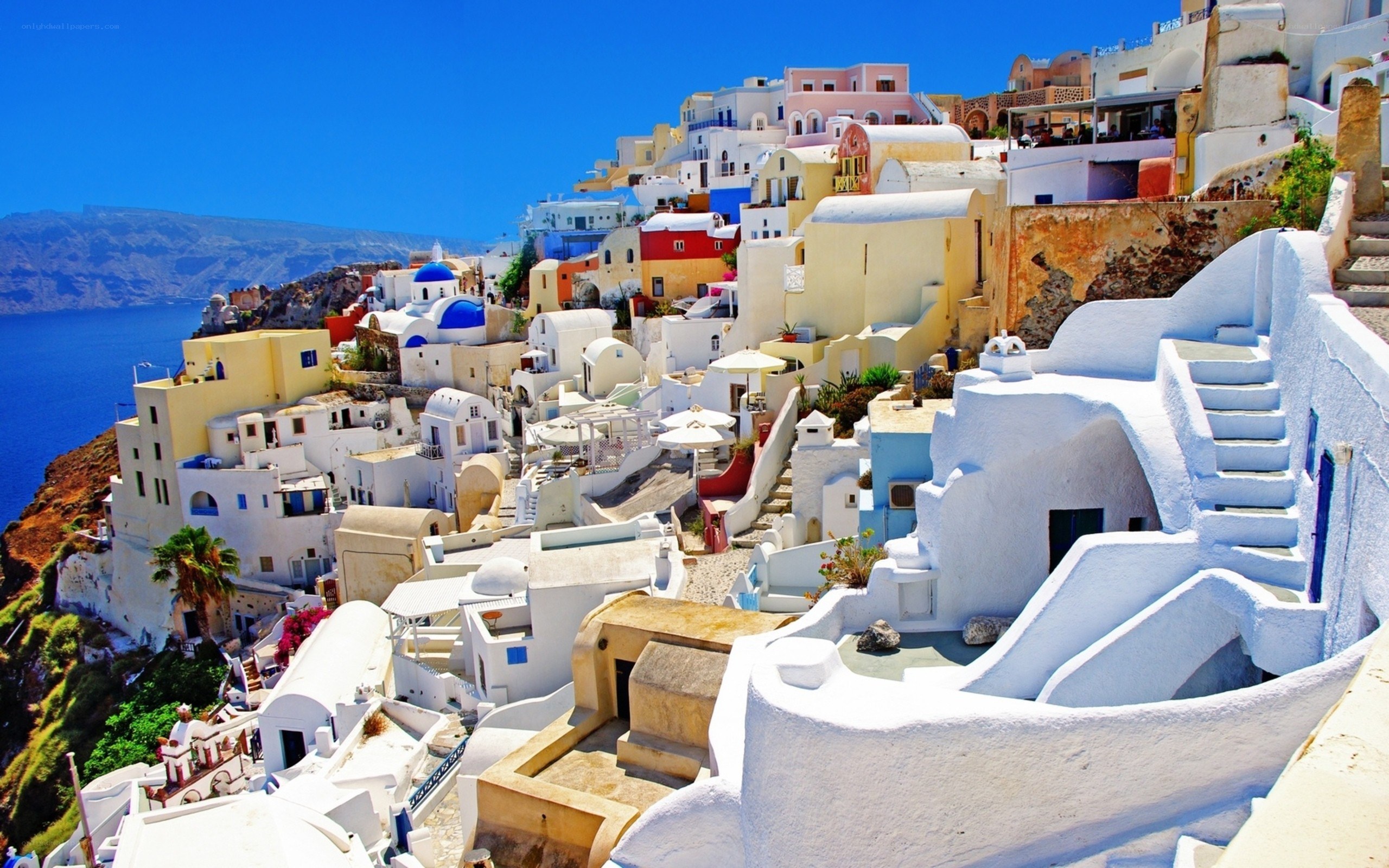 Whitewashed village on Greek cliff