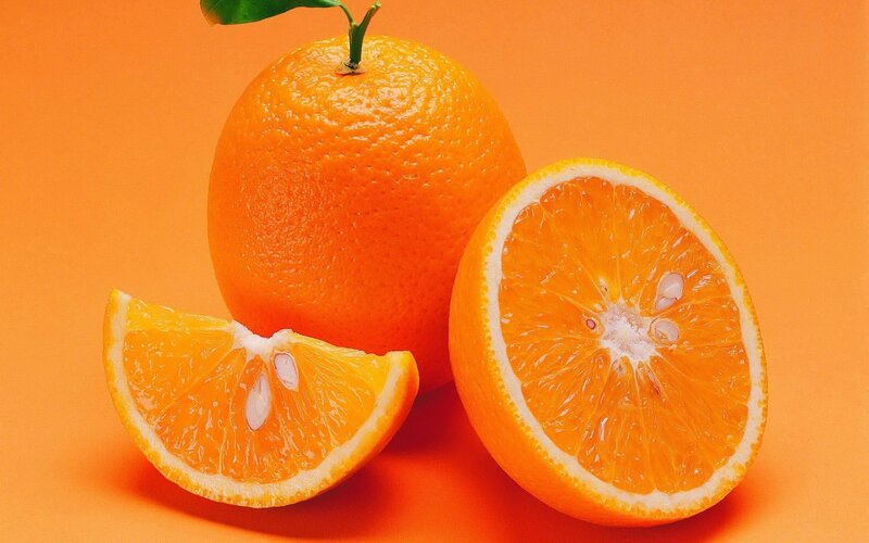 Whole and Sliced Orange — Vibrant