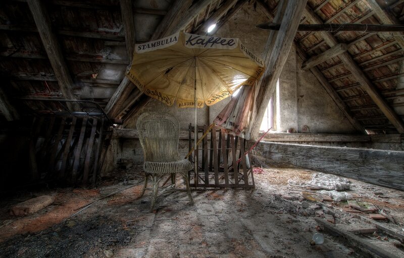 Wicker Chair under Umbrella
