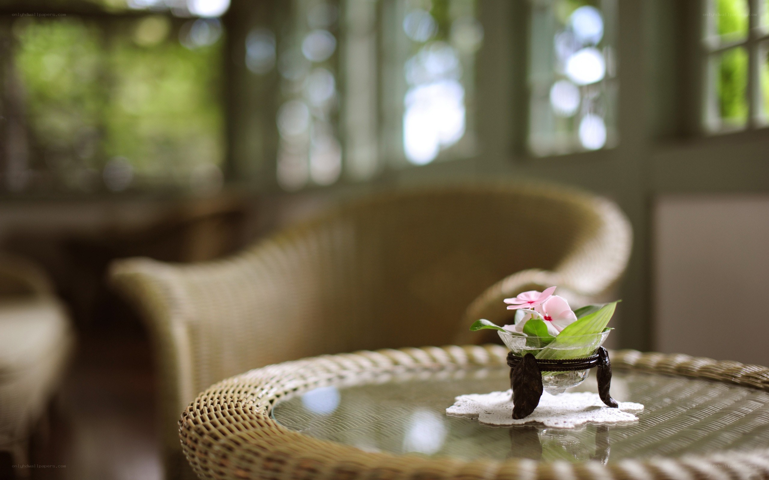 Wicker table with flower arrangement