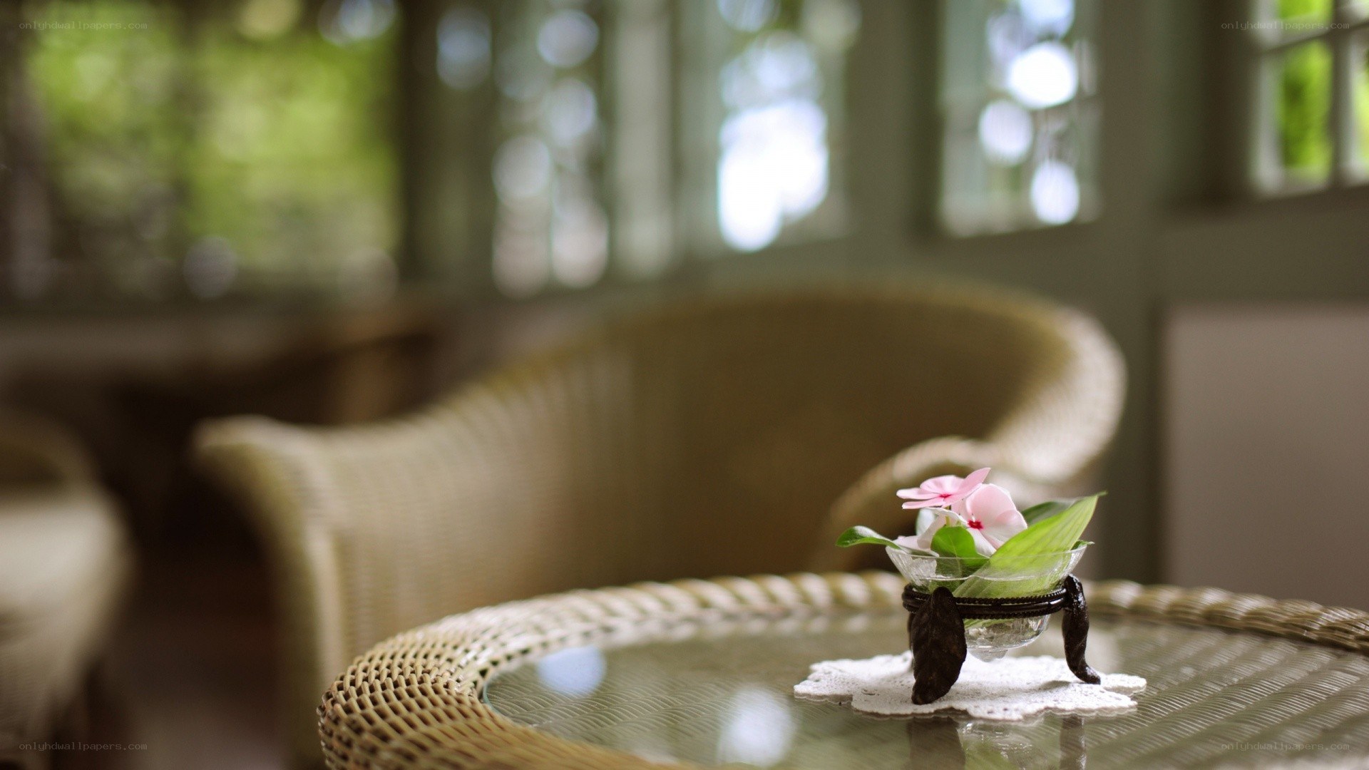 Wicker table with flower arrangement